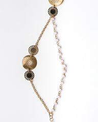 Bracciale color oro con pietre rosa