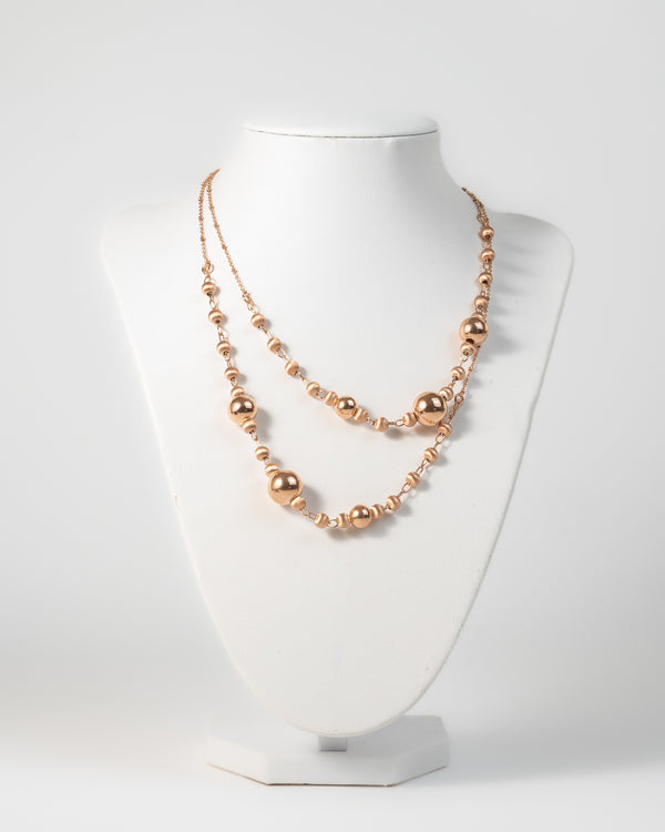 Collana con decorazione di sfere di diverse dimensioni